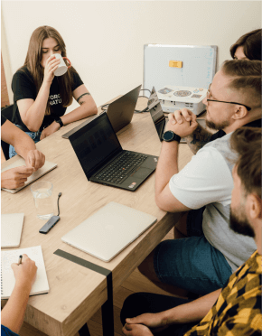 Group of employees discussing project plans